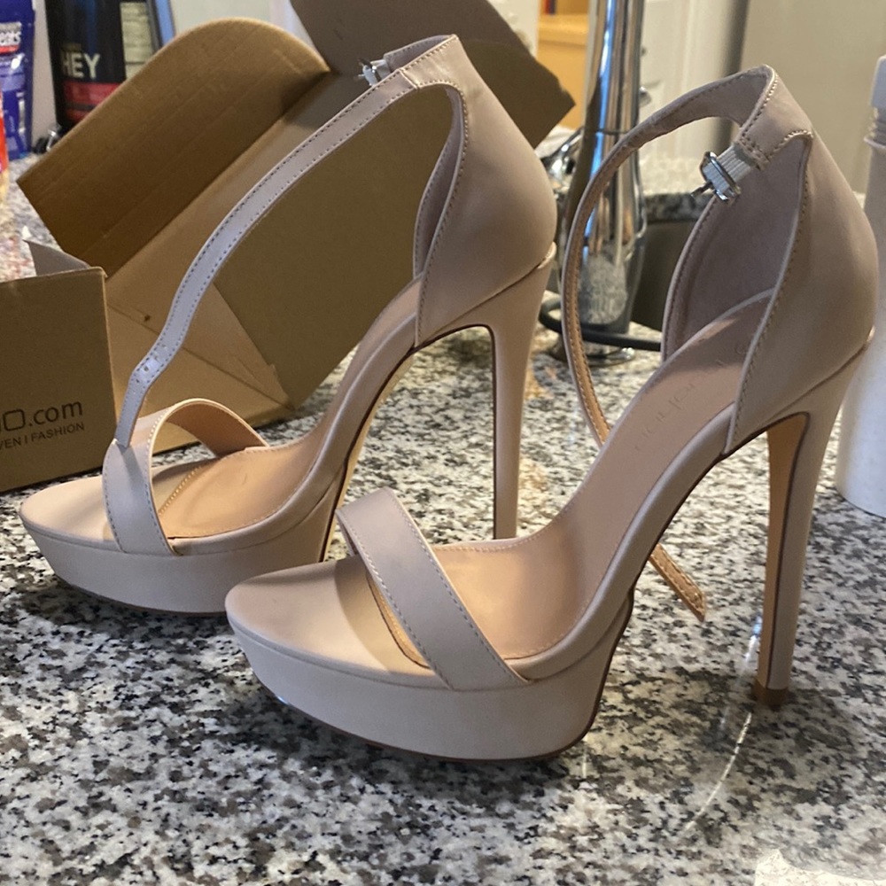 Never worn heels